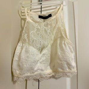 Ivory/ Crème color lace crop top perfect for going out
